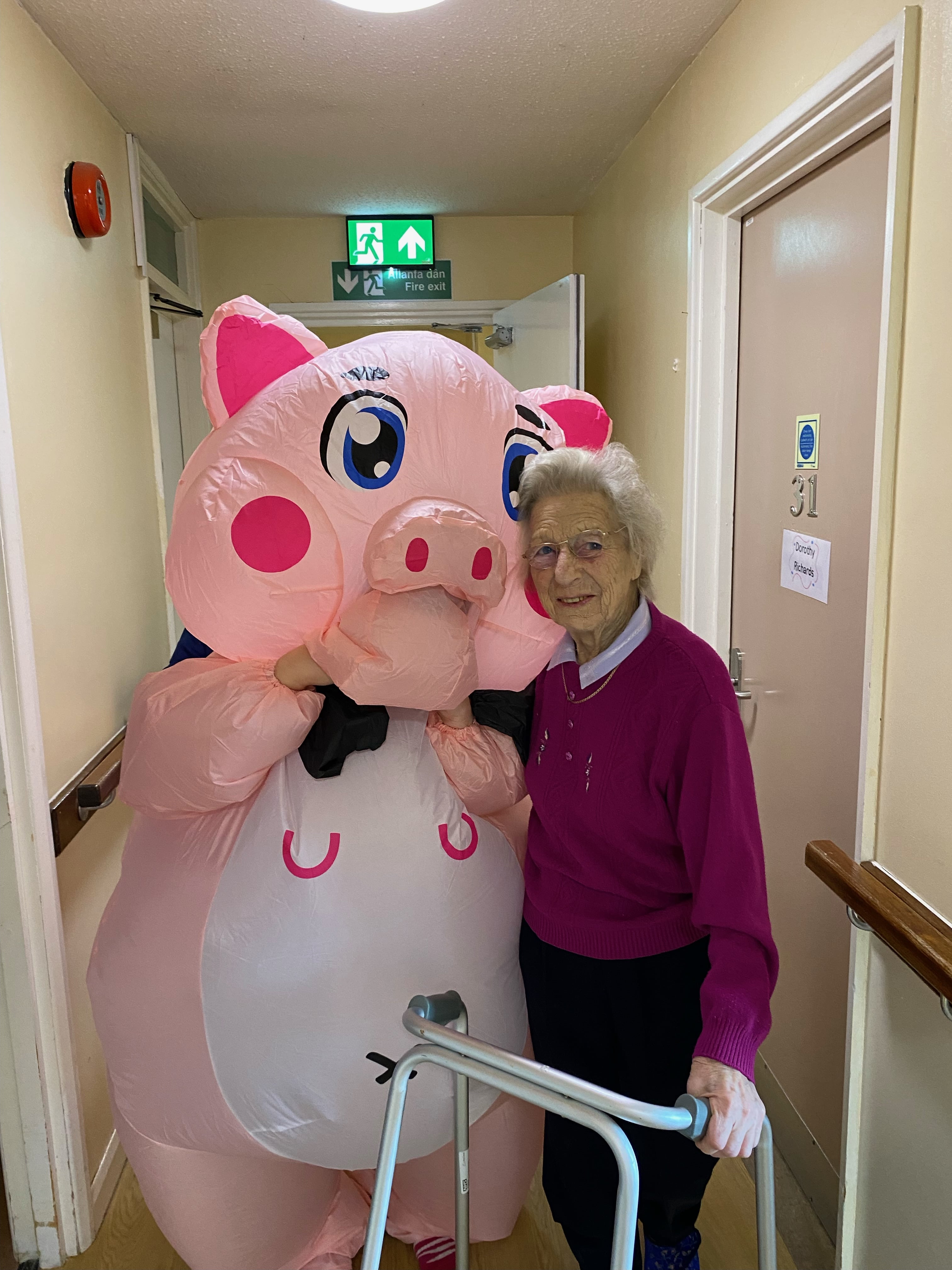 Percy the pig with resident 