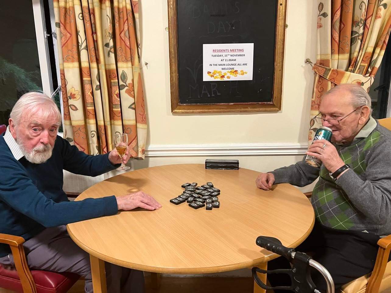 David and Ewan enjoying a drink and dominos game.