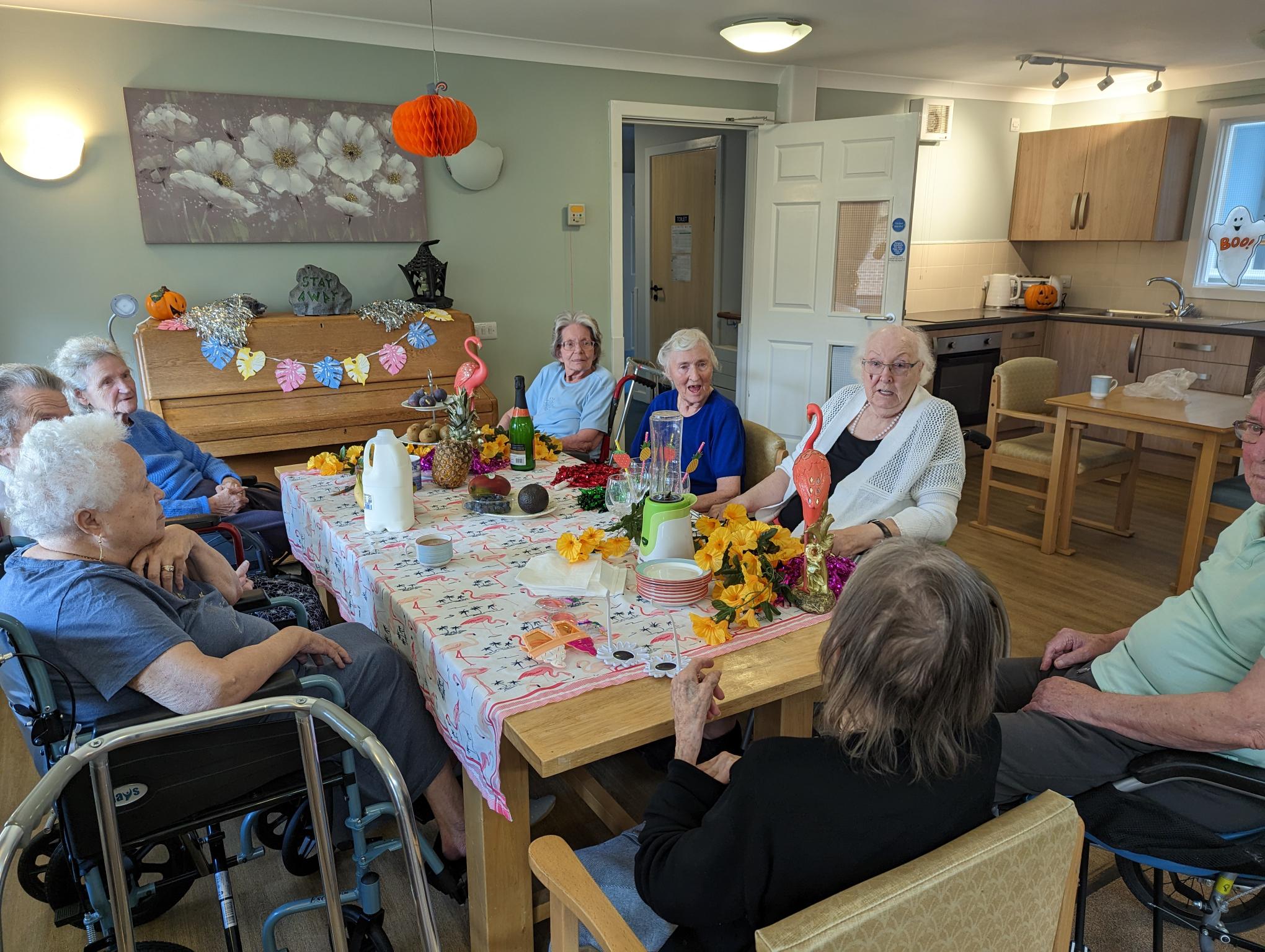 residents at Glebe House trying and making different smoothies