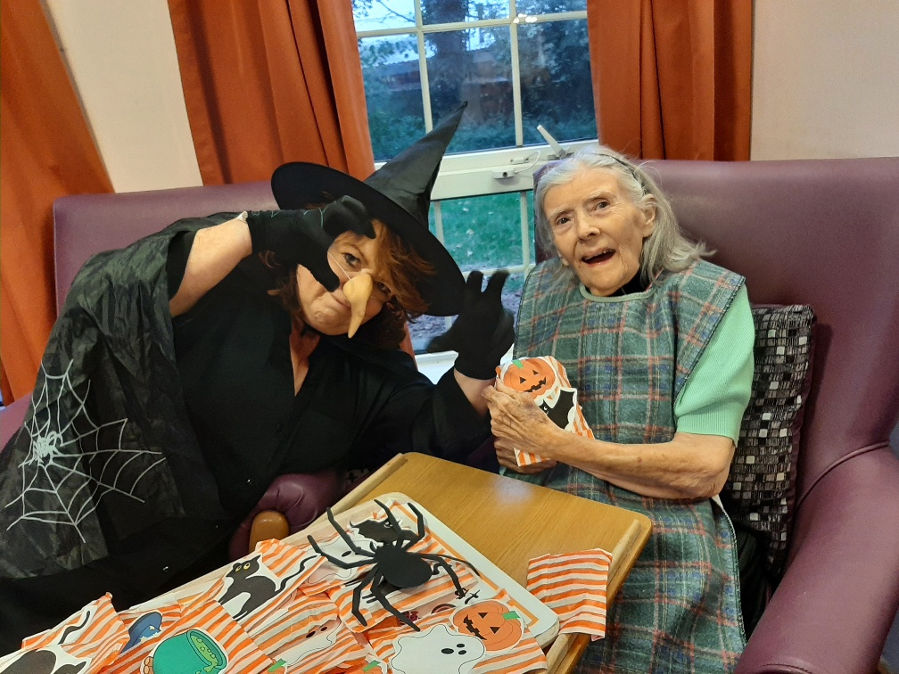 A witch with one of the residents 