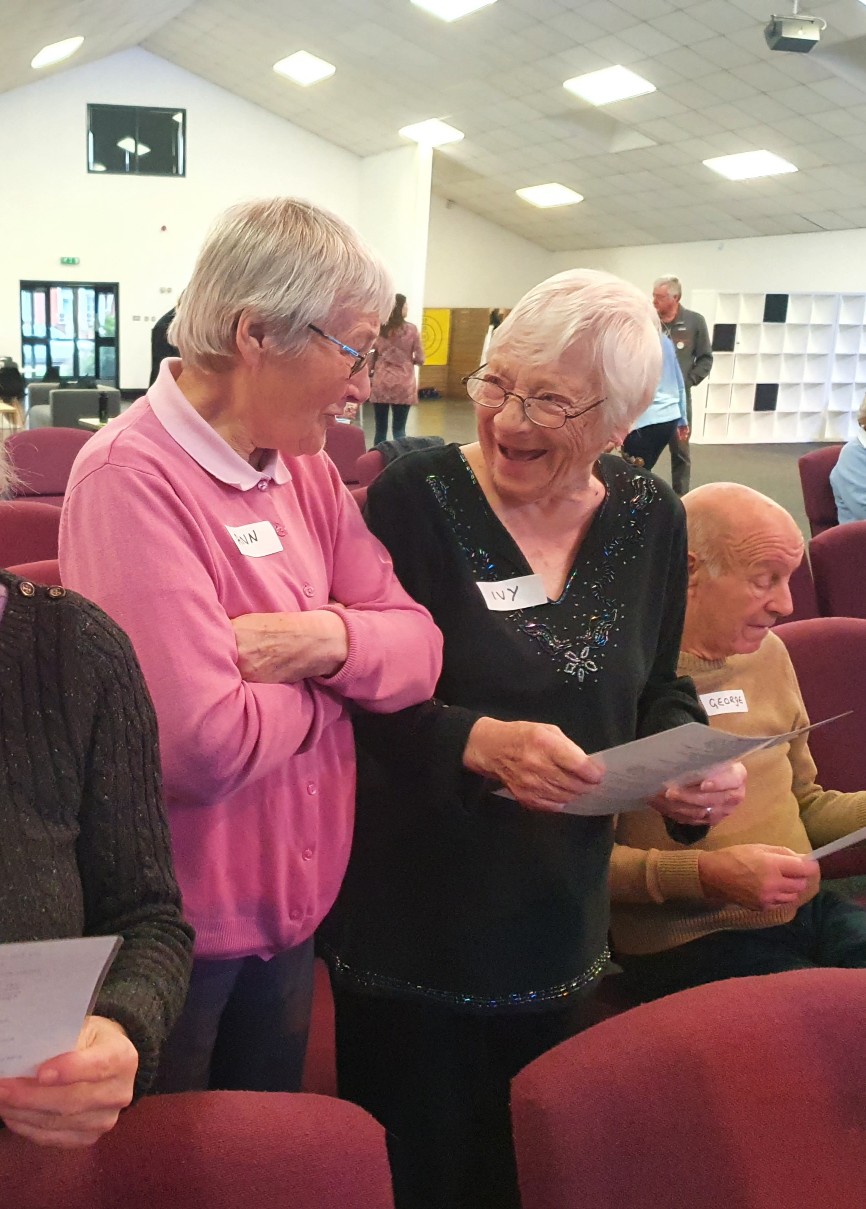 Two residents having a good time at the Wellingborough community choir