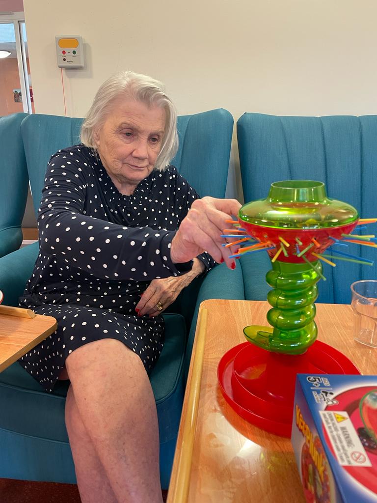 care home residents playing games