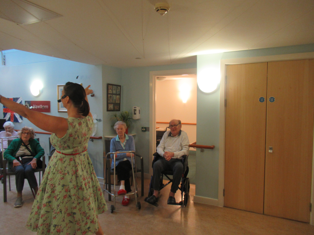 Just Add Sparkle singing with residents 