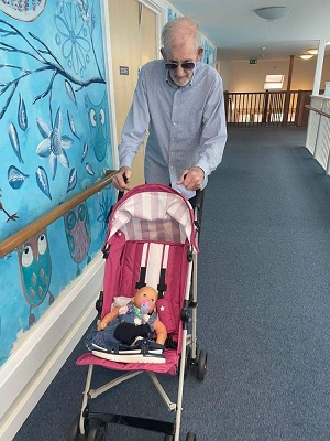 Doll therapy at care home in Steyning