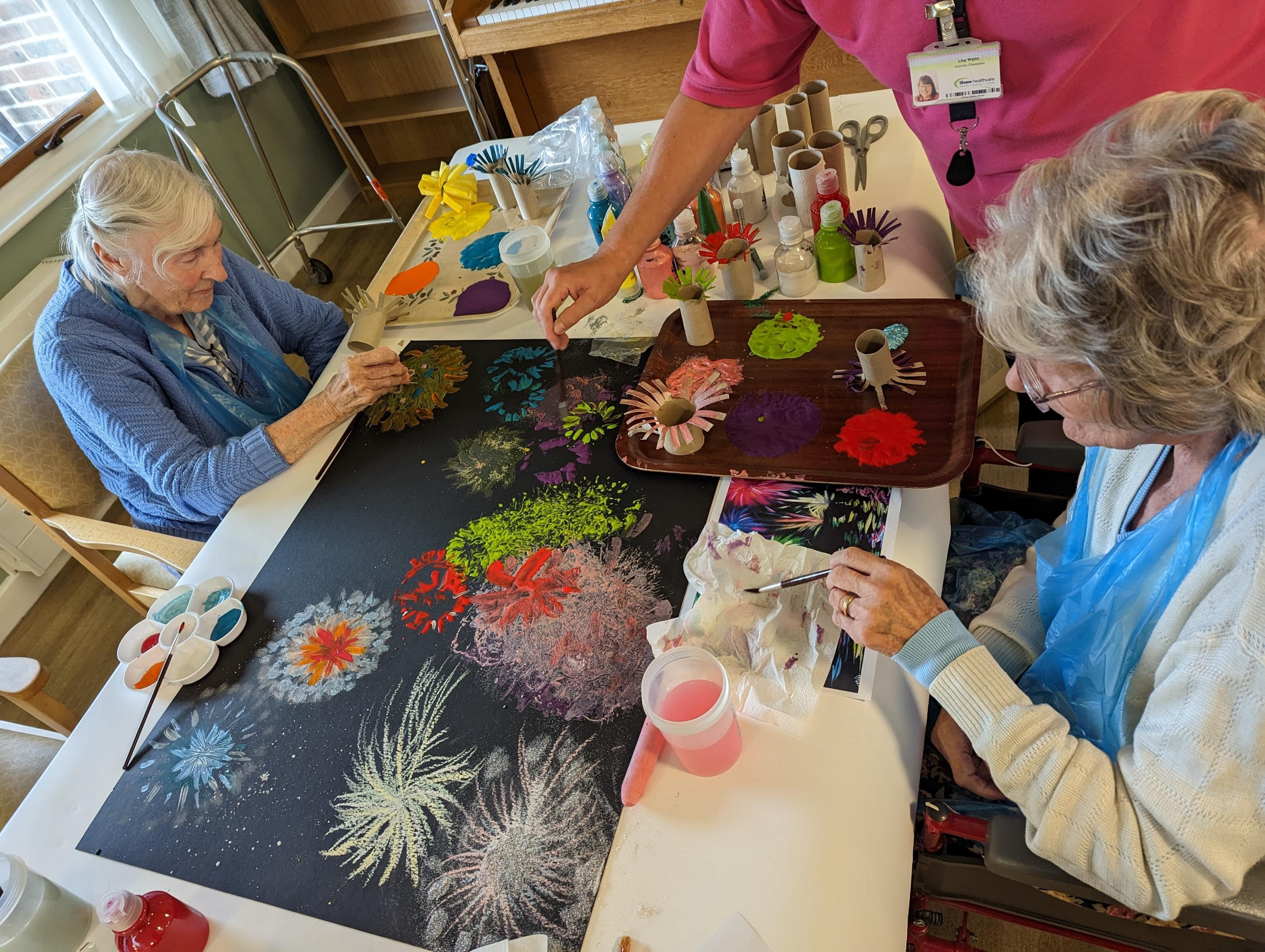 residents painting a firework display