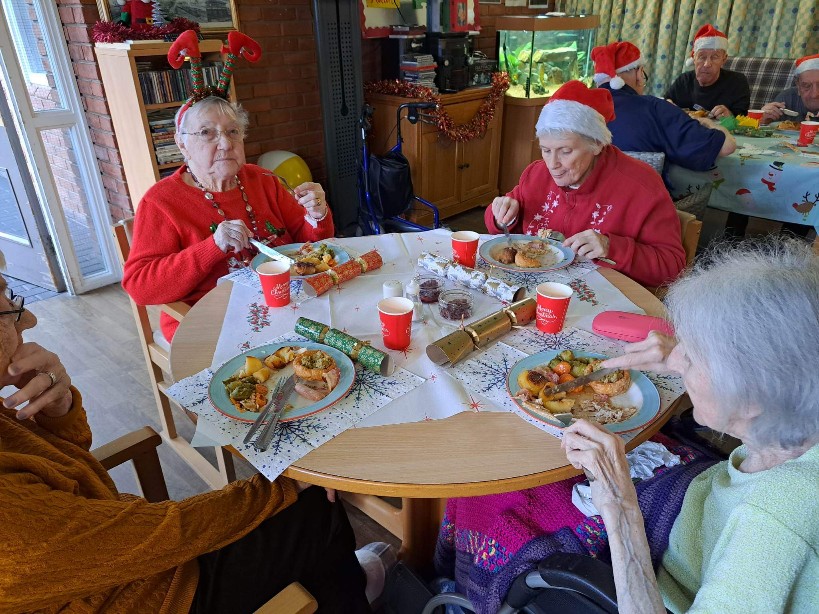 residents eating Christmas lunch